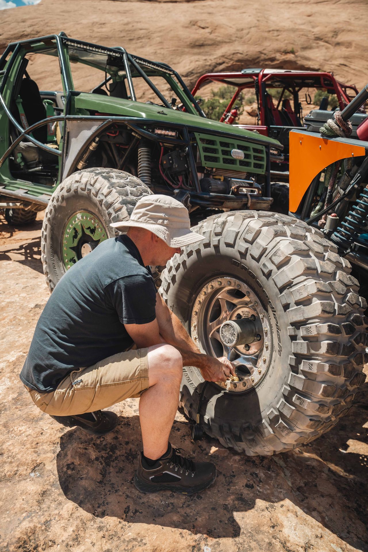 Trailside tire repair on a rock crawler